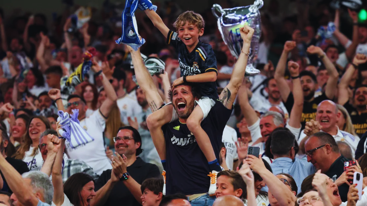 Real Madrid fans celebrate during the Champions League final against Borussia Dortmund. Thomas Coex/AFP/Getty Images